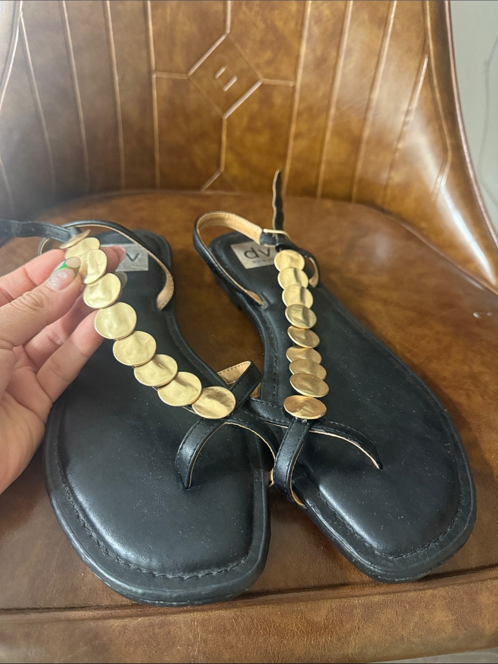 Dolce vita Black Women's T-Strap Sandals with Gold Disc Accents.